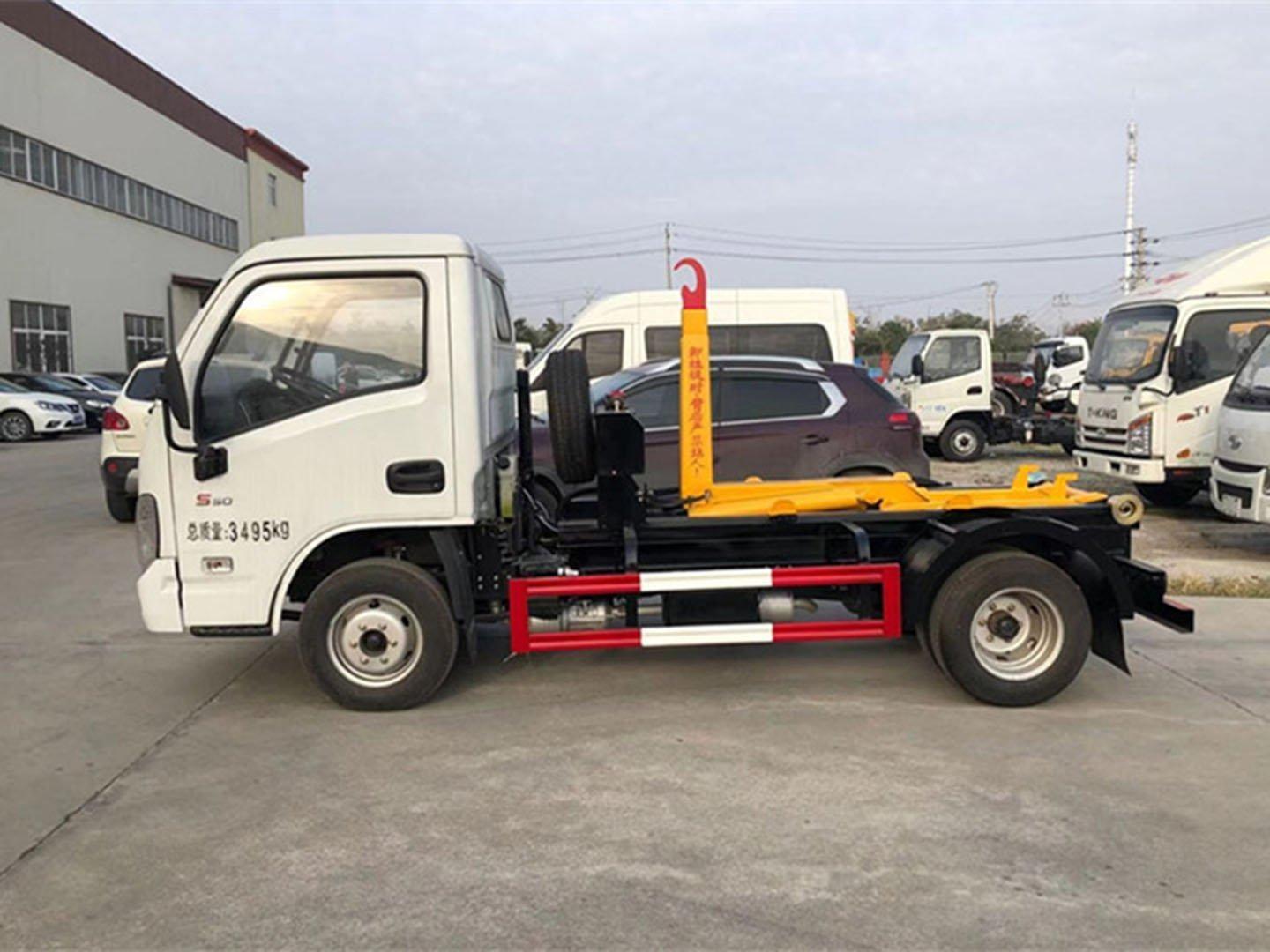 Small Yuejin roll-off garbage truck details