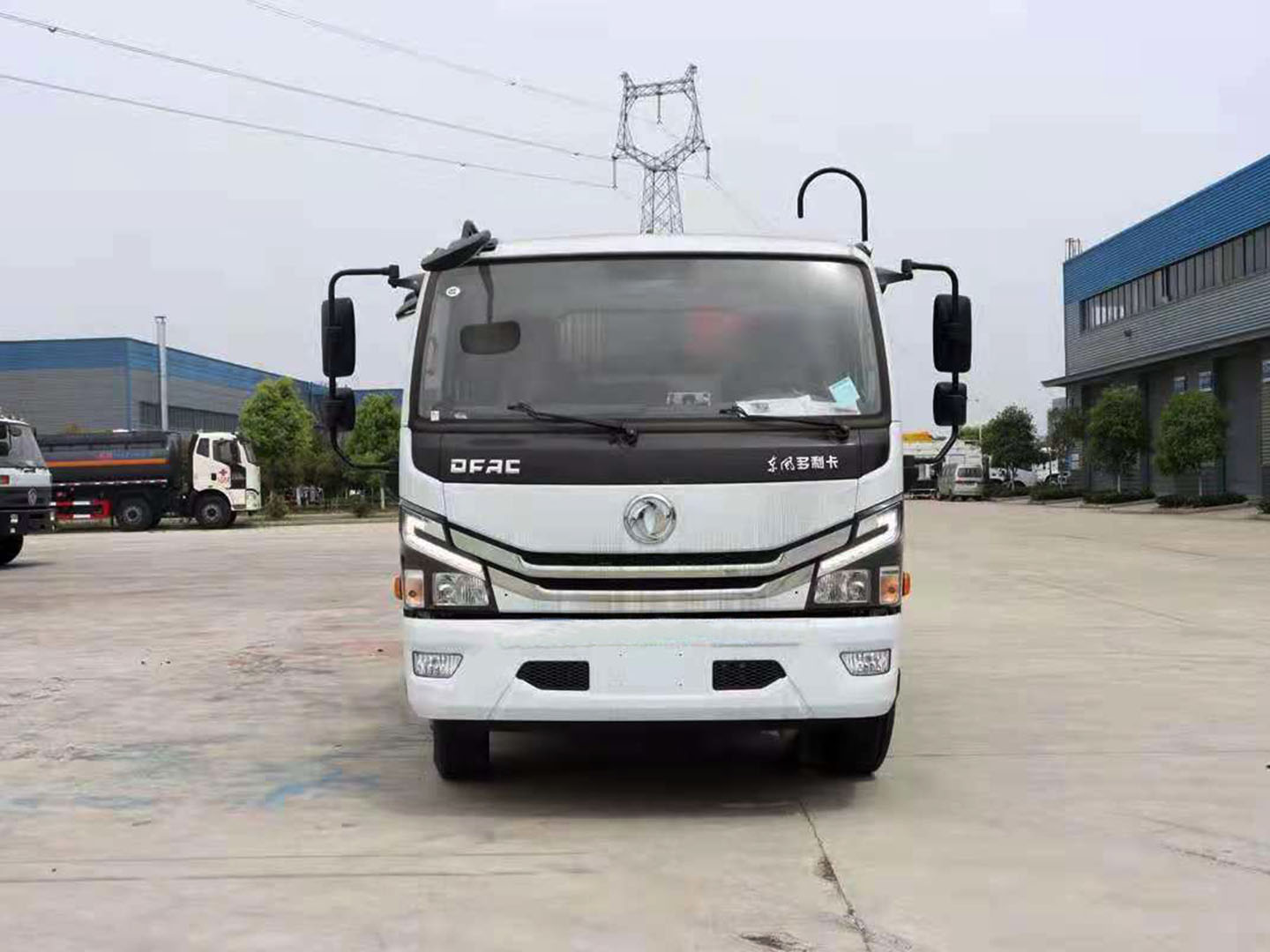 Front view of Dongfeng 8 CBM compactor garbage truck